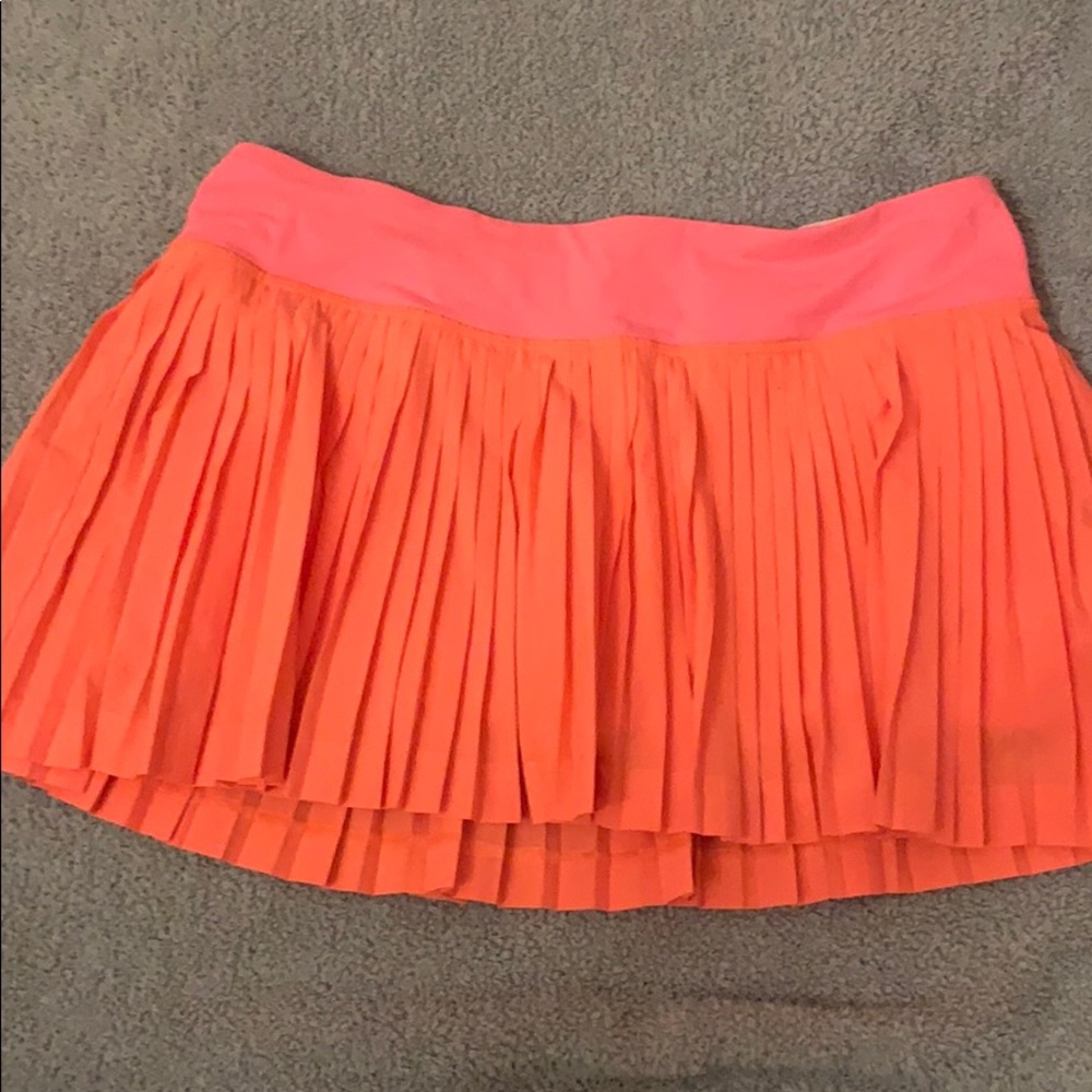 Lululemon pleat to street II skirt in grapefruit